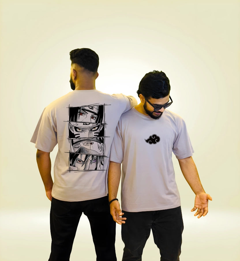 Model wearing grey Naruto Akatsuki graphic oversized tee, styled with black pants, anime streetwear look