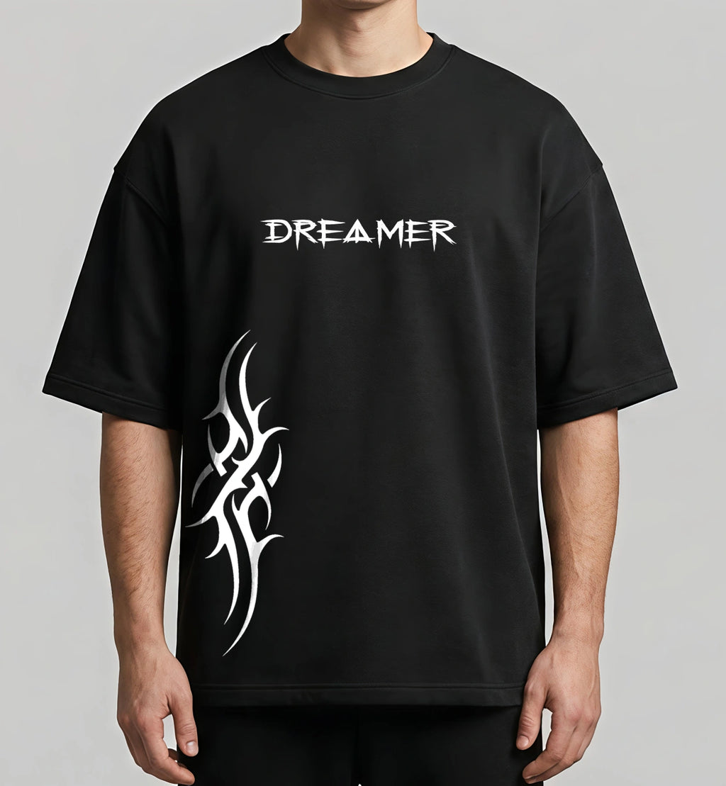Dreamer oversized black t-shirt with minimal typography and abstract side graphic streetwear design