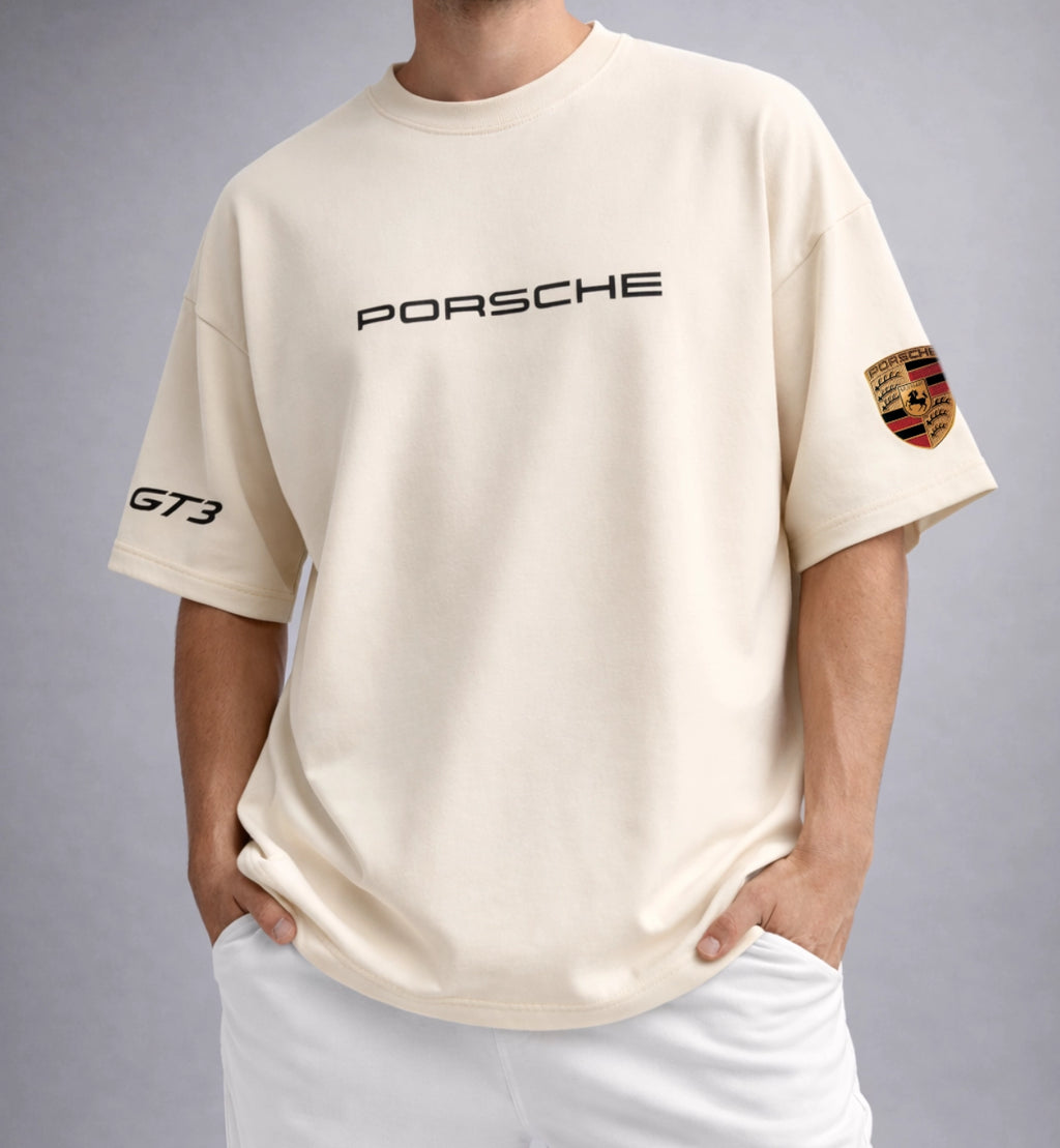 Men wearing cream Porsche GT3 oversized t-shirt with minimal logo design